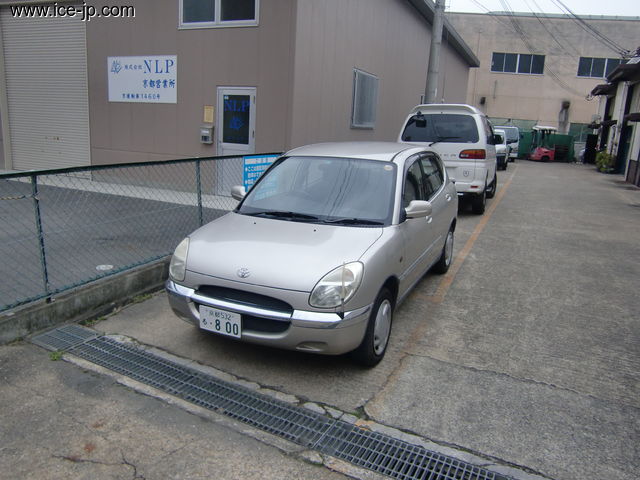 front of car M100A - 1998 Toyota Duet X - Silver